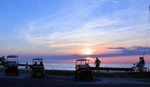 Golf carts sunset.brighter cropped